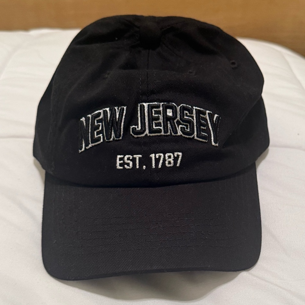 Black New Jersey cap
NEVER WORN!!
